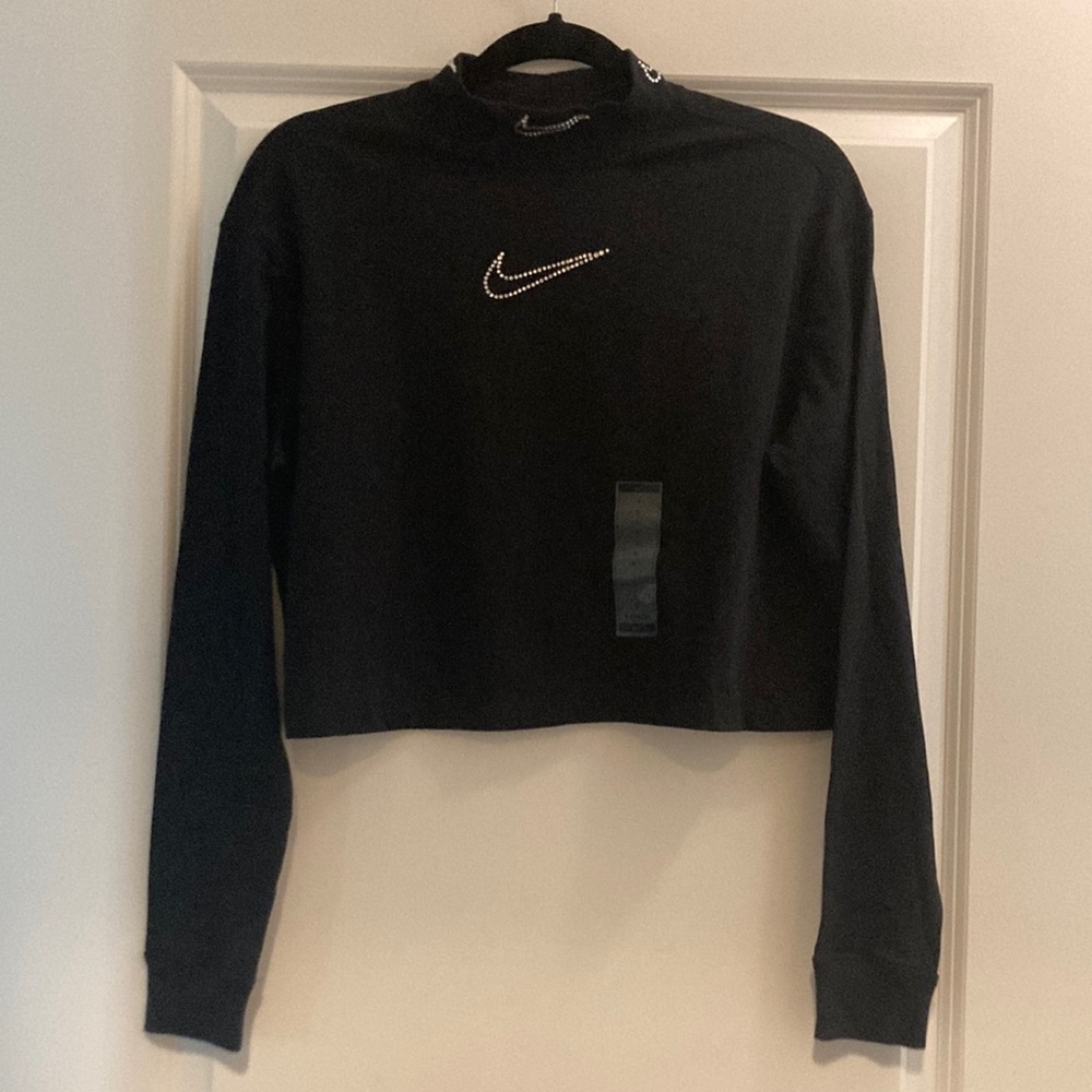 Nike Swoosh rhinestone appliqué cropped long sleeve mock neck top in black NWT.